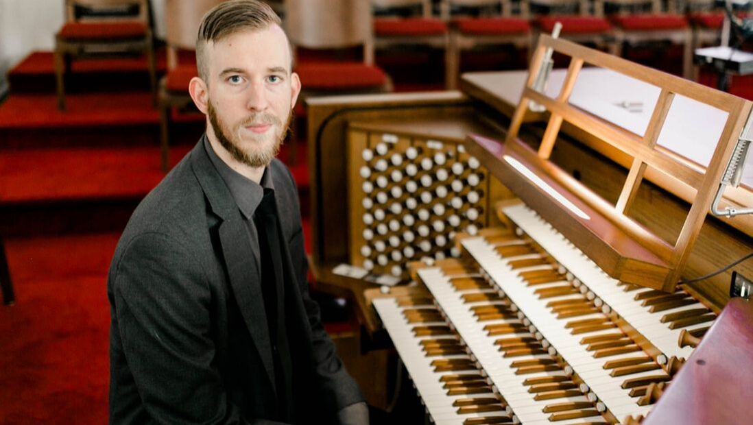 Christopher at the organ console during a recorded performance